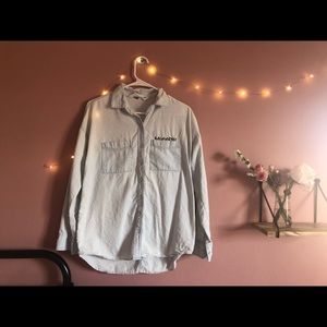 teal blue button down with hand embroidered pocket